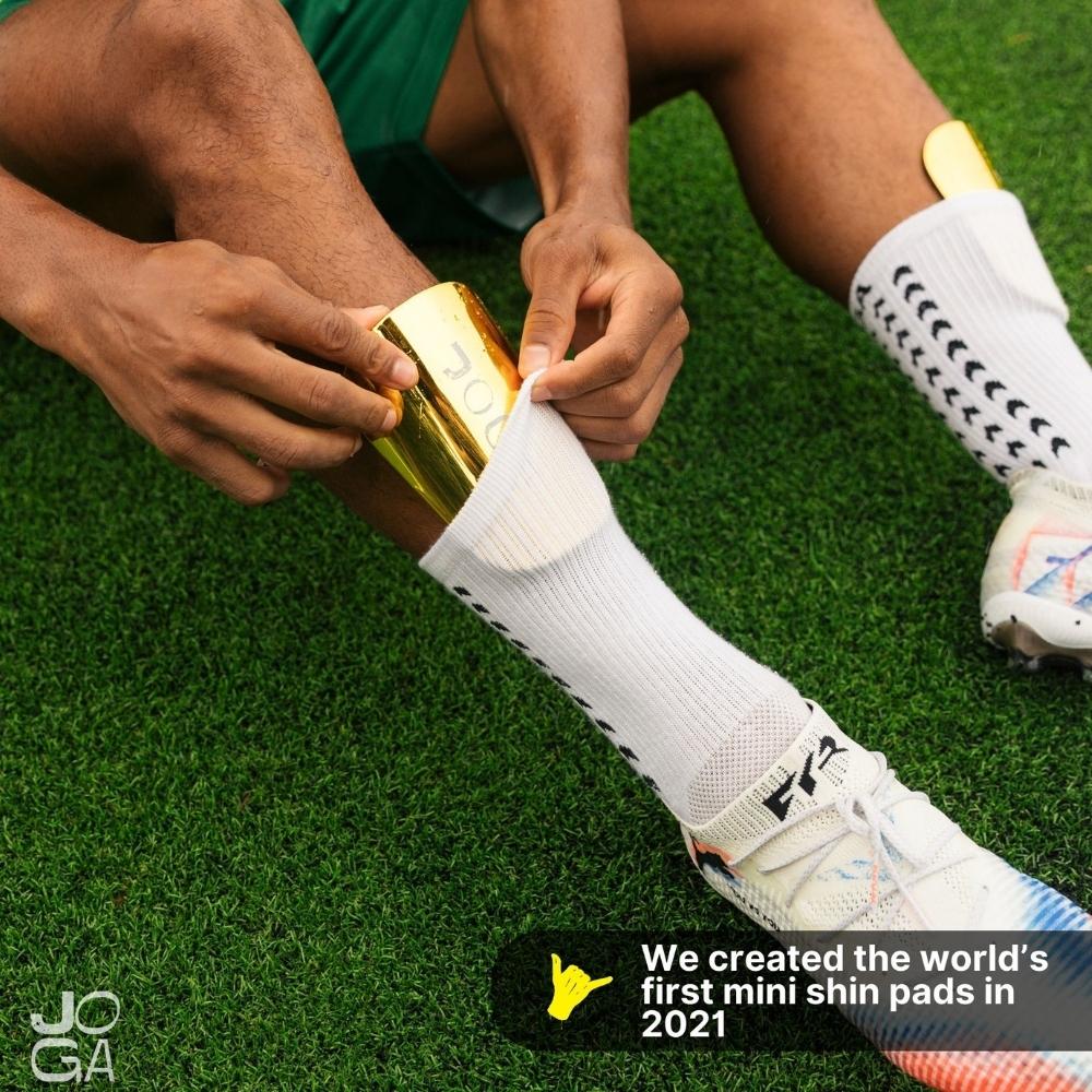 Paquete de mini toallas sanitarias doradas